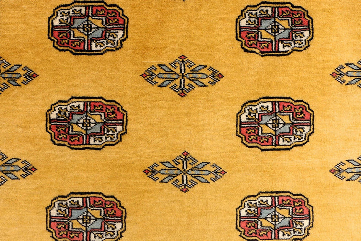 Goldenrod Pakistani Bokhara Rug 4' 1" x 6' 6" Hand-Knotted | No. QA81067