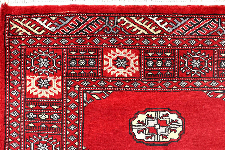 Red Pakistani Bokhara Rug 4' 1" x 6' 3" Hand-Knotted | No. QA82029