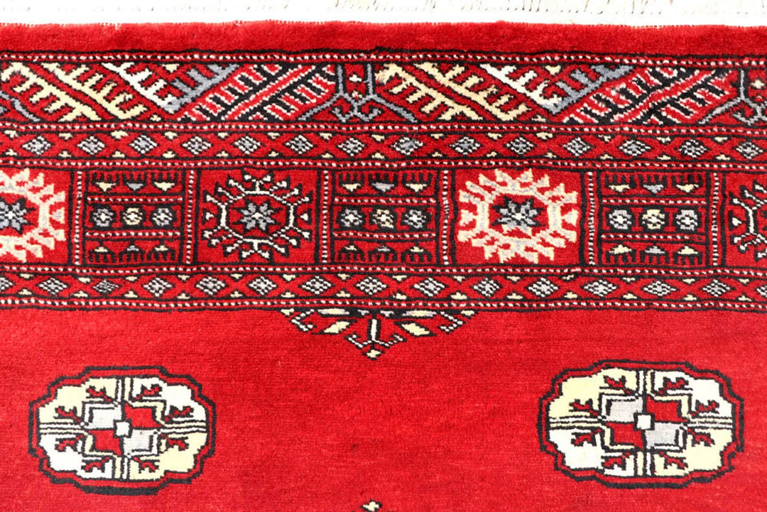 Red Pakistani Bokhara Rug 4' 1" x 6' 3" Hand-Knotted | No. QA82029
