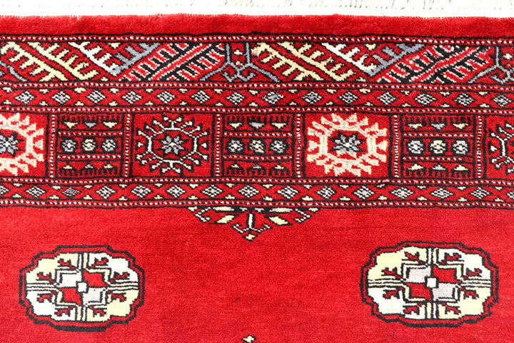 Red Pakistani Bokhara Rug 4' 1" x 6' 3" Hand-Knotted | No. QA82029