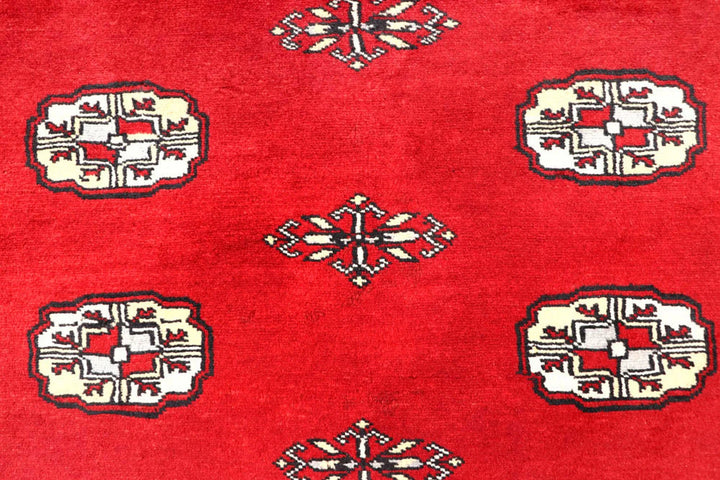 Red Pakistani Bokhara Rug 4' 1" x 6' 3" Hand-Knotted | No. QA82029