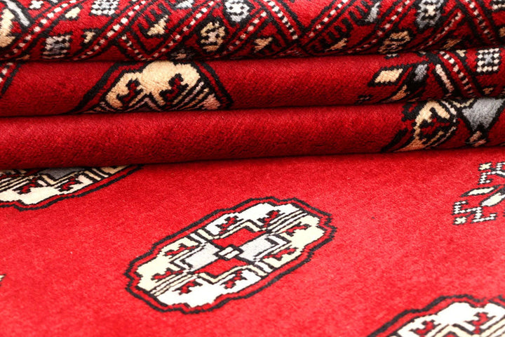 Red Pakistani Bokhara Rug 4' 1" x 6' 3" Hand-Knotted | No. QA82029