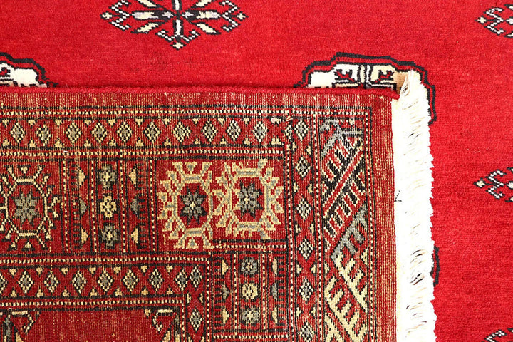 Red Pakistani Bokhara Rug 4' 1" x 6' 3" Hand-Knotted | No. QA82029