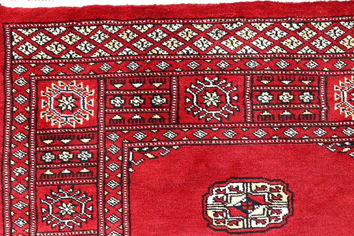 Red Bokhara Rug 4' 2" x 6' 4" Hand-Knotted | No. QA82382