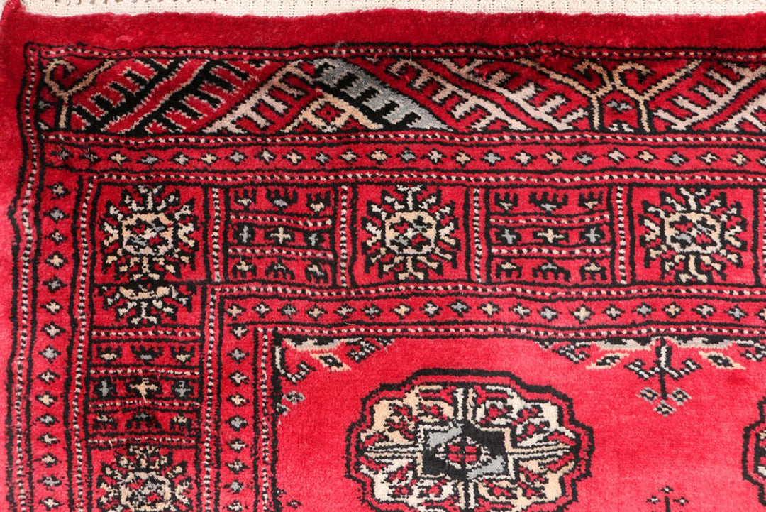 Red Pakistani Bokhara Rug 3' 1" x 5' 3" Hand-Knotted | No. QA82474