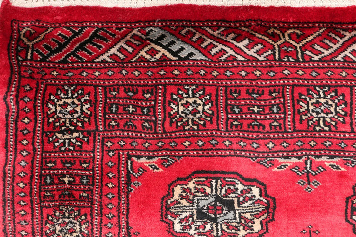 Red Pakistani Bokhara Rug 3' 1" x 5' 3" Hand-Knotted | No. QA82474