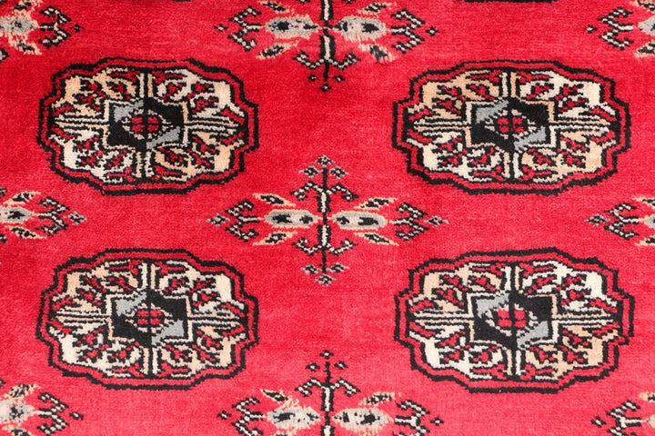 Red Pakistani Bokhara Rug 3' 1" x 5' 3" Hand-Knotted | No. QA82474