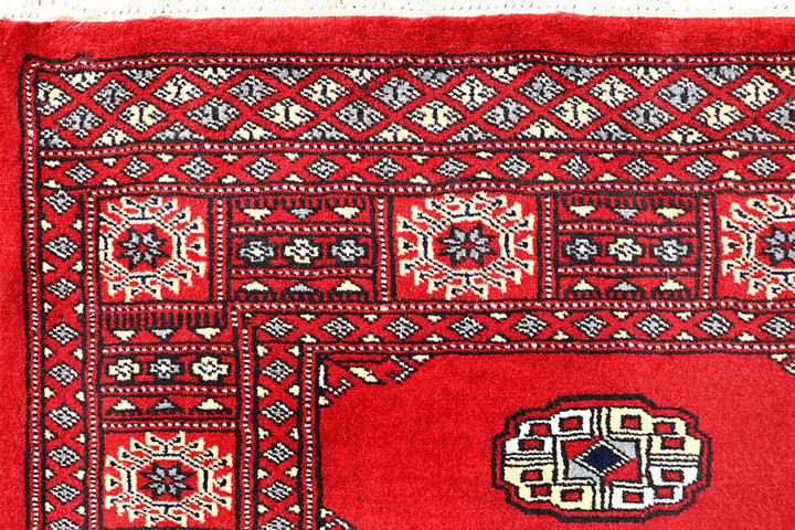 Red Pakistani Bokhara Rug 4' 3" x 5' 10" Hand-Knotted | No. QA82833