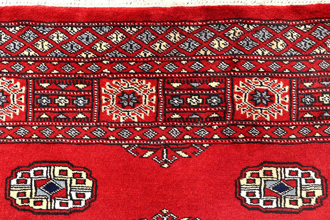 Red Pakistani Bokhara Rug 4' 3" x 5' 10" Hand-Knotted | No. QA82833
