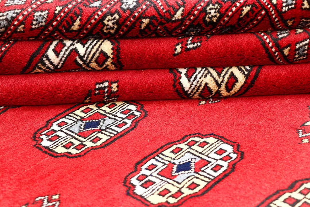 Red Pakistani Bokhara Rug 4' 3" x 5' 10" Hand-Knotted | No. QA82833