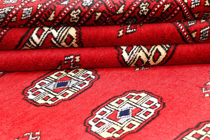 Red Pakistani Bokhara Rug 4' 3" x 5' 10" Hand-Knotted | No. QA82833