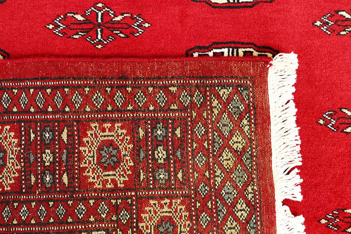 Red Pakistani Bokhara Rug 4' 3" x 5' 10" Hand-Knotted | No. QA82833