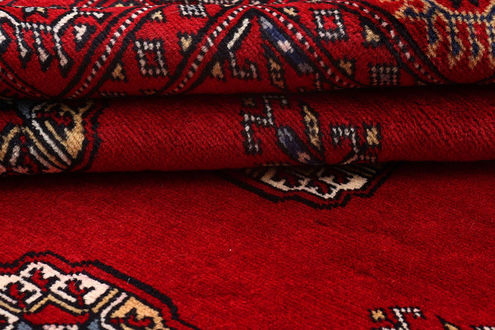Red Bokhara Rug 4' 1" x 6' 11" Hand-Knotted | No. QA83018