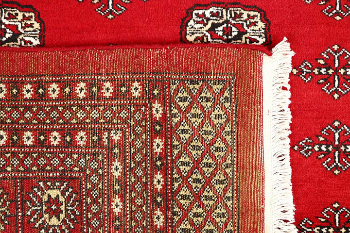 Red Pakistani Bokhara Rug 9' 4" x 11' 10" Hand-Knotted | No. QA83028