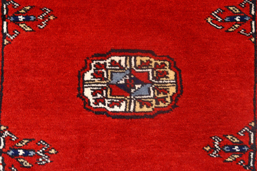 Red Pakistani Bokhara Rug 2' 6" x 10' Hand-Knotted | No. QA83173
