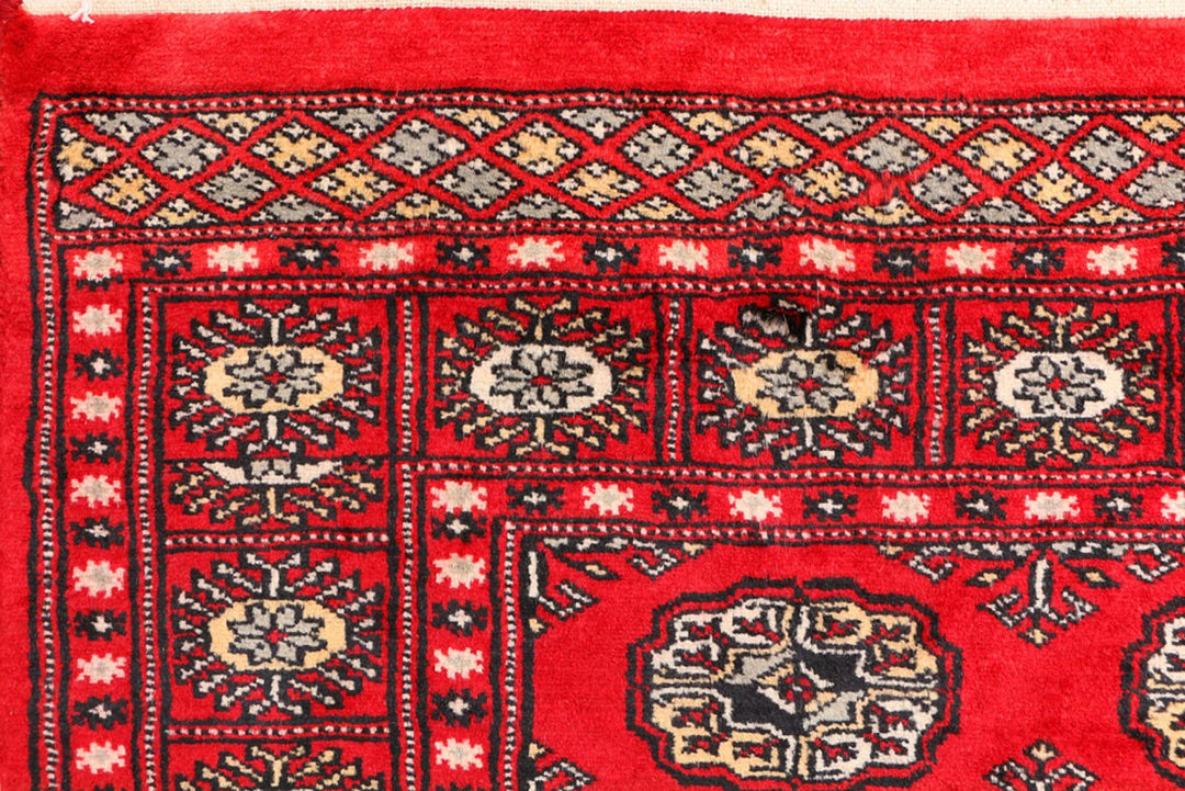Red Pakistani Bokhara Rug 3' 1" x 5' 7" Hand-Knotted | No. QA83223