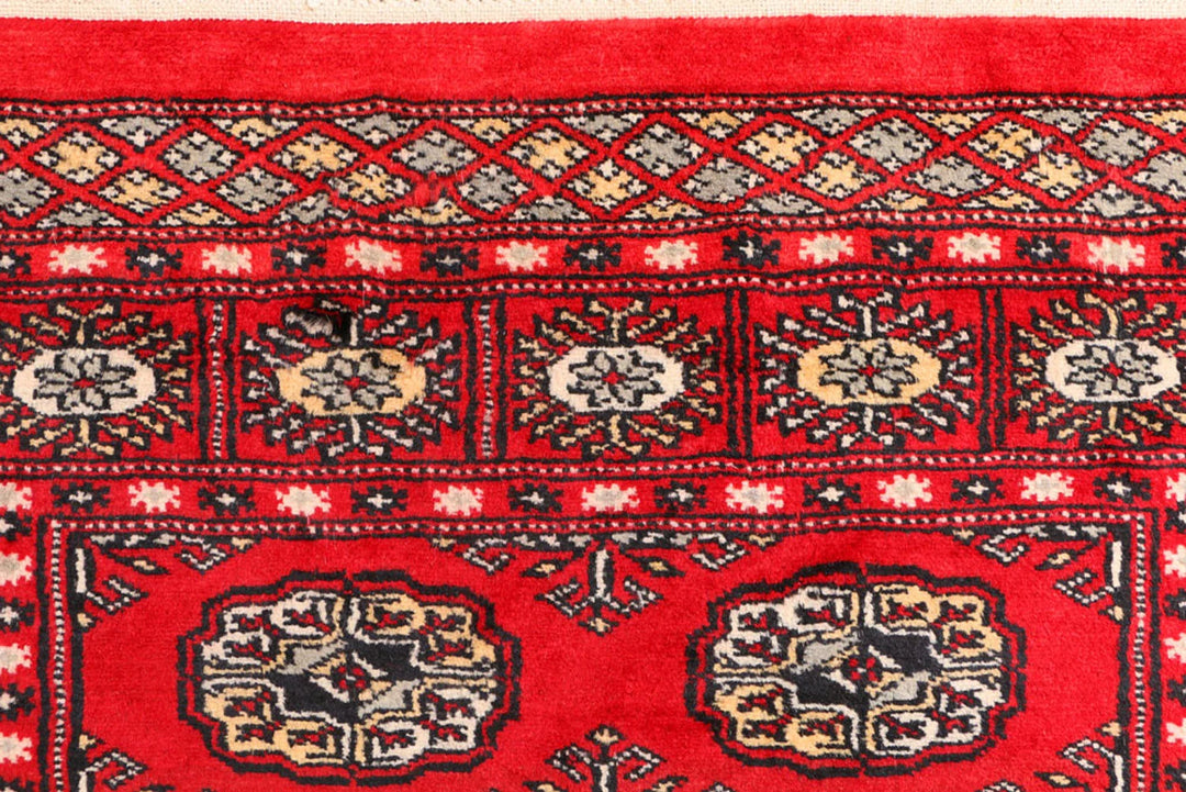 Red Pakistani Bokhara Rug 3' 1" x 5' 7" Hand-Knotted | No. QA83223