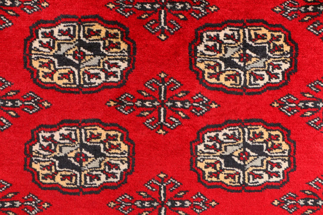 Red Pakistani Bokhara Rug 3' 1" x 5' 7" Hand-Knotted | No. QA83223