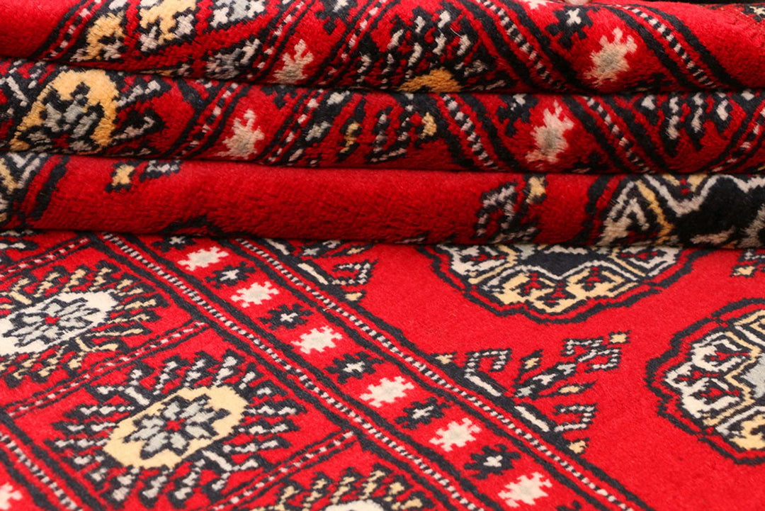 Red Pakistani Bokhara Rug 3' 1" x 5' 7" Hand-Knotted | No. QA83223