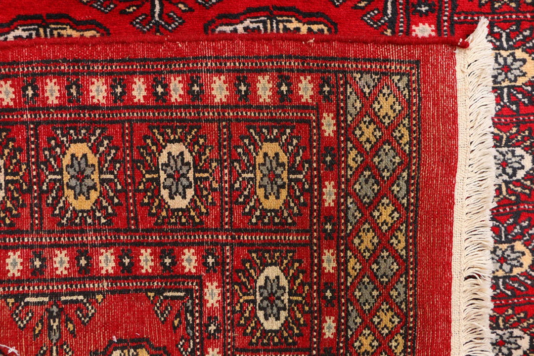 Red Pakistani Bokhara Rug 3' 1" x 5' 7" Hand-Knotted | No. QA83223