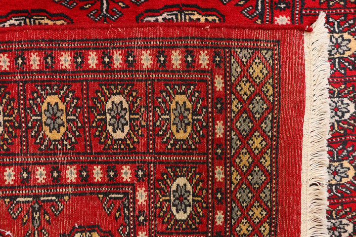 Red Pakistani Bokhara Rug 3' 1" x 5' 7" Hand-Knotted | No. QA83223