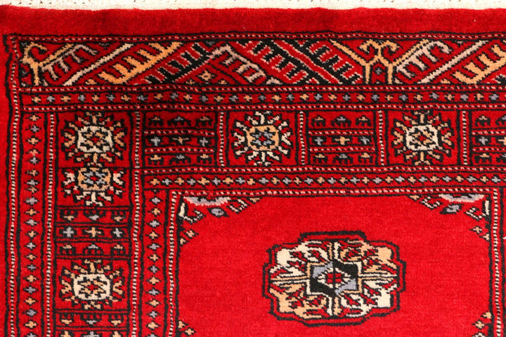 Dark Red Pakistani Bokhara Rug 2' 7" x 8' 9" Hand-Knotted | No. QA83354