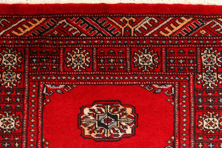 Dark Red Pakistani Bokhara Rug 2' 7" x 8' 9" Hand-Knotted | No. QA83354