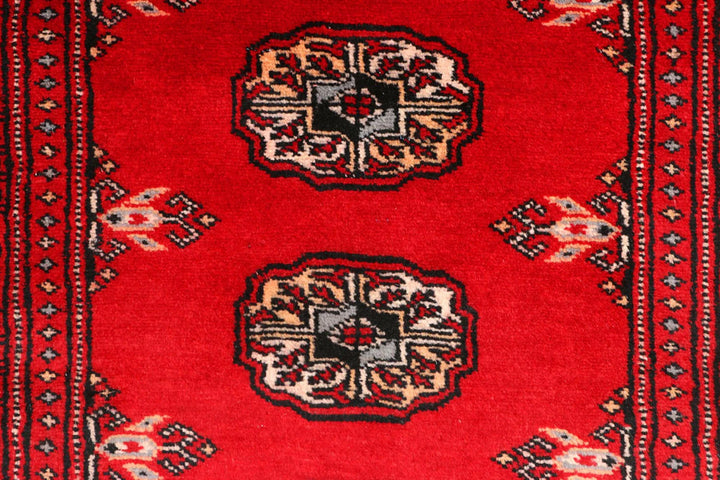 Dark Red Pakistani Bokhara Rug 2' 7" x 8' 9" Hand-Knotted | No. QA83354