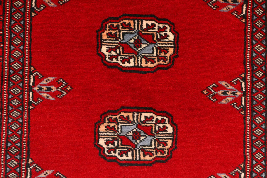Red Pakistani Bokhara Rug 2' 8" x 8' 11" Hand-Knotted | No. QA83455