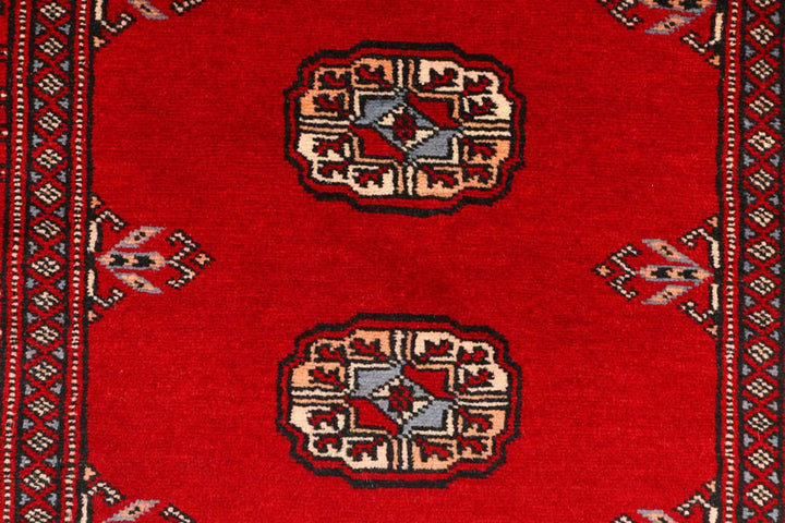 Red Pakistani Bokhara Rug 2' 8" x 8' 11" Hand-Knotted | No. QA83455