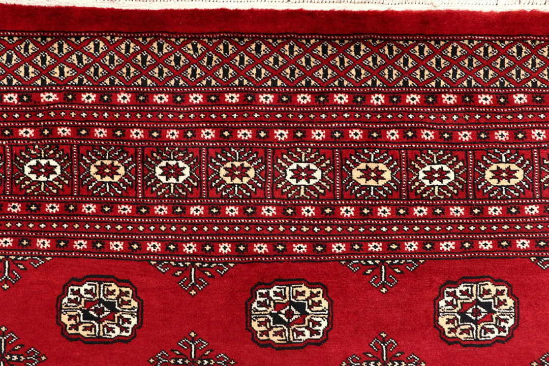 Red Pakistani Bokhara Rug 8' 1" x 10' 5" Hand-Knotted | No. QA83529