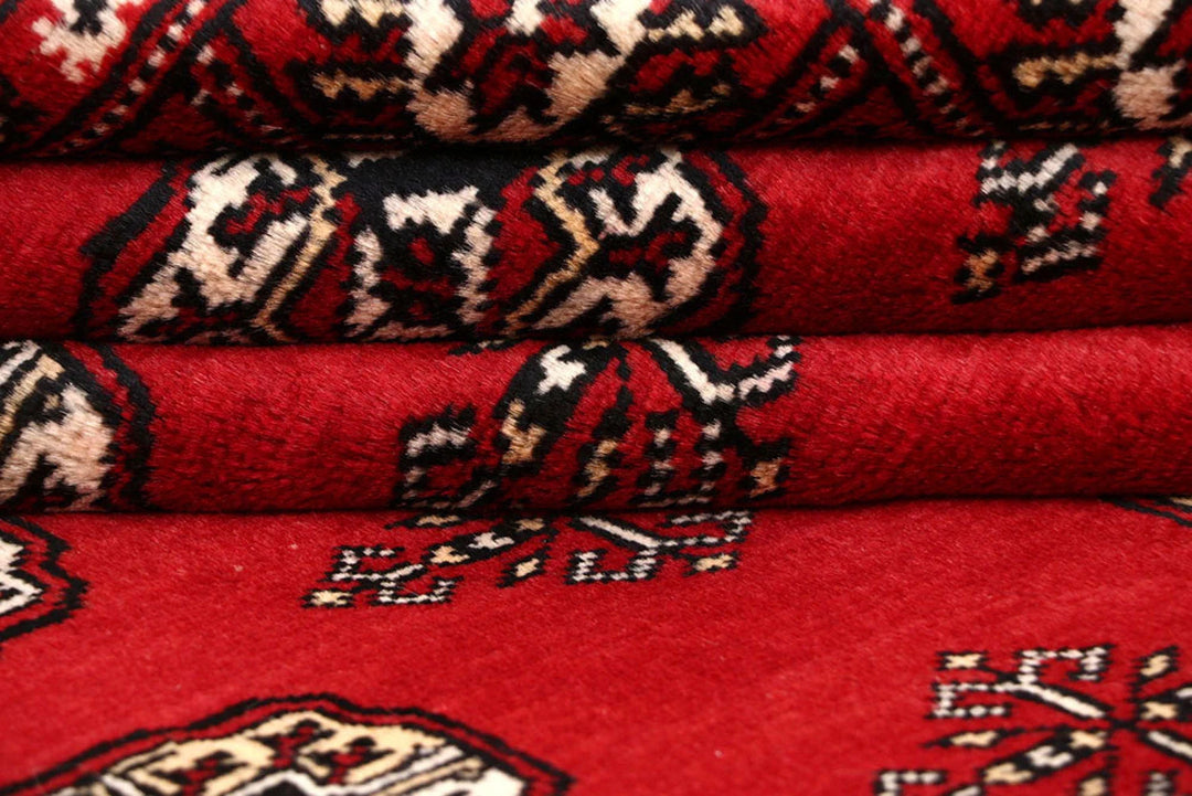 Red Pakistani Bokhara Rug 8' 1" x 10' 5" Hand-Knotted | No. QA83529