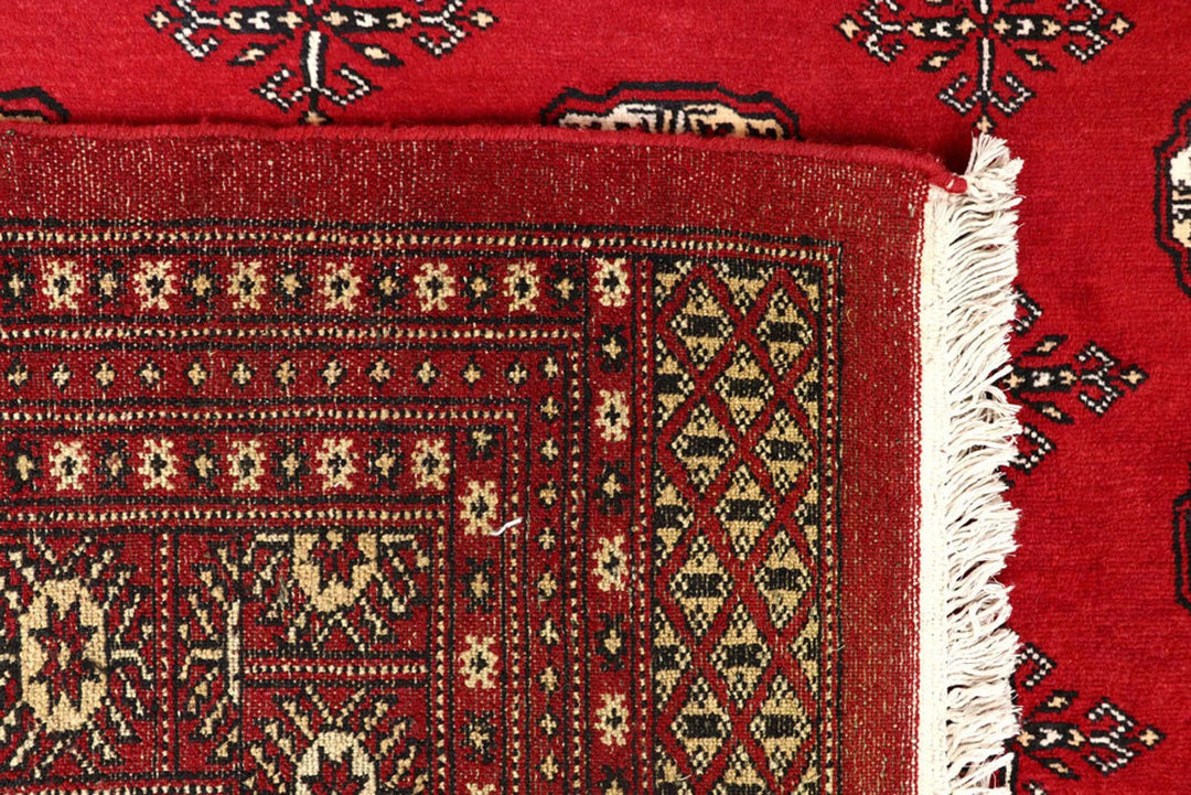 Red Pakistani Bokhara Rug 8' 1" x 10' 5" Hand-Knotted | No. QA83529