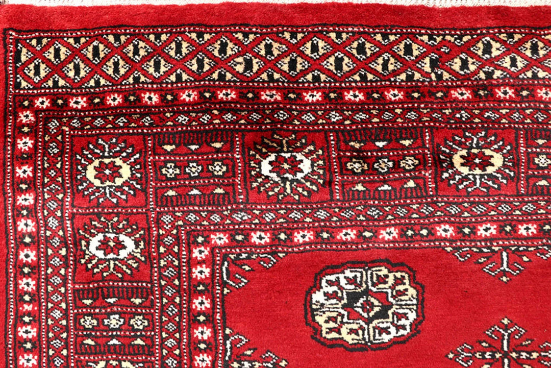 Red Pakistani Bokhara Rug 5' 7" x 8' 9" Hand-Knotted | No. QA84159