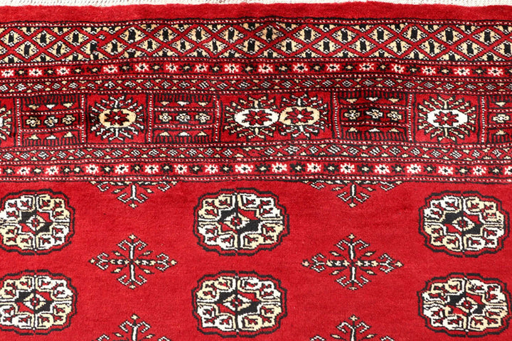 Red Pakistani Bokhara Rug 5' 7" x 8' 9" Hand-Knotted | No. QA84159