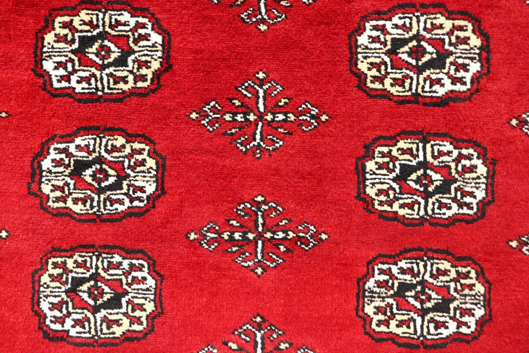 Red Pakistani Bokhara Rug 5' 7" x 8' 9" Hand-Knotted | No. QA84159