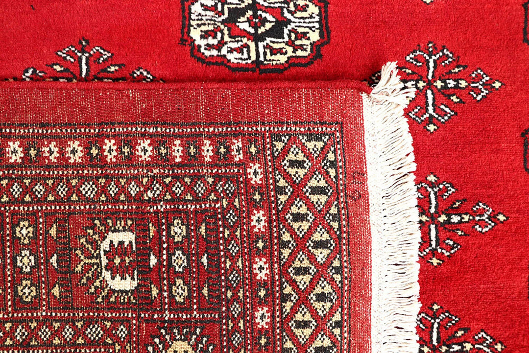 Red Pakistani Bokhara Rug 5' 7" x 8' 9" Hand-Knotted | No. QA84159