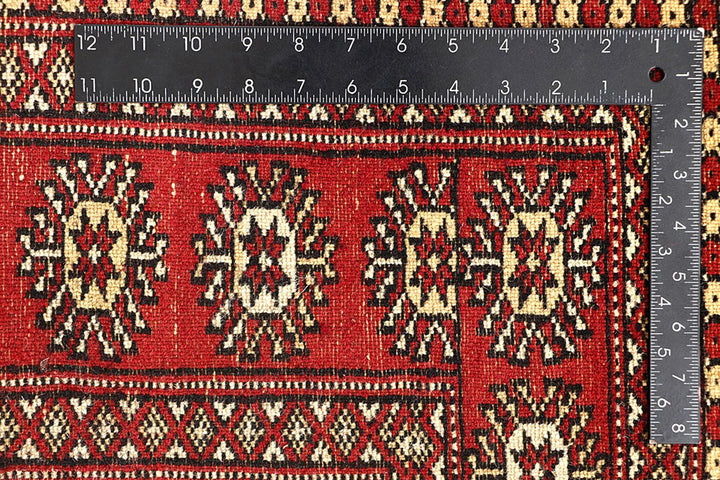 Red Pakistani Bokhara Rug 5' 5" x 8' 6" Hand-Knotted | No. QA84407