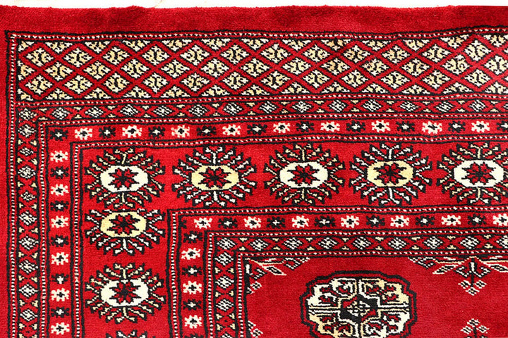 Red Pakistani Bokhara Rug 6' 2" x 8' 5" Hand-Knotted | No. QA84409