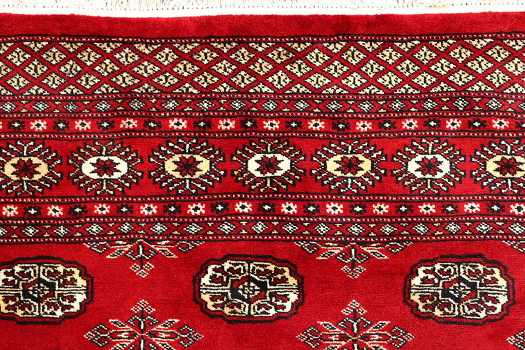 Red Pakistani Bokhara Rug 6' 2" x 8' 5" Hand-Knotted | No. QA84409