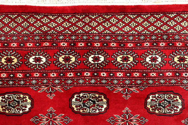 Red Pakistani Bokhara Rug 6' 2" x 8' 5" Hand-Knotted | No. QA84409