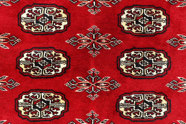 Red Pakistani Bokhara Rug 6' 2" x 8' 5" Hand-Knotted | No. QA84409