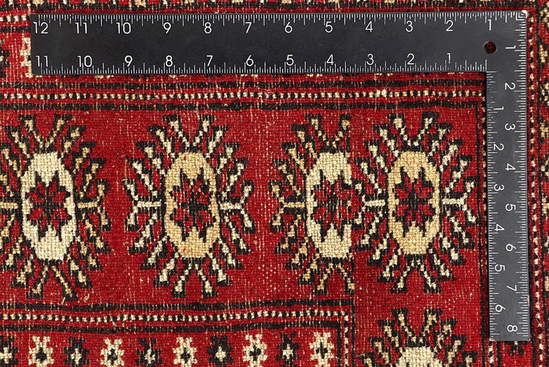 Red Pakistani Bokhara Rug 6' 2" x 8' 5" Hand-Knotted | No. QA84409