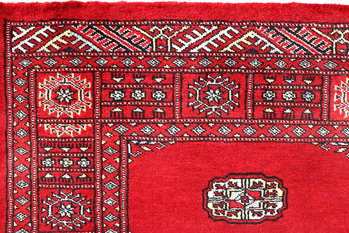Red Pakistani Bokhara Rug 4' 1" x 5' 11" Hand-Knotted | No. QA84637