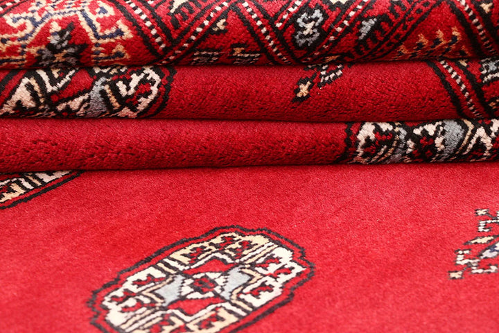 Red Pakistani Bokhara Rug 4' 1" x 5' 11" Hand-Knotted | No. QA84637