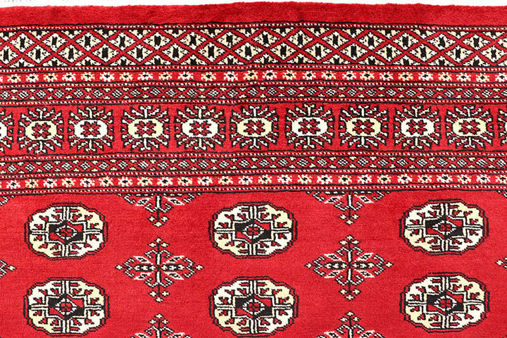 Firebrick Pakistani Bokhara Rug 5' 1" x 8' 2" Hand-Knotted | No. QA84776
