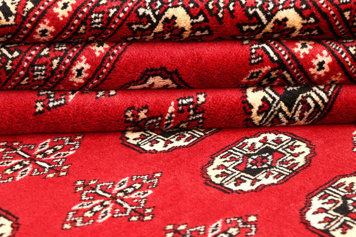 Firebrick Pakistani Bokhara Rug 5' 1" x 8' 2" Hand-Knotted | No. QA84776