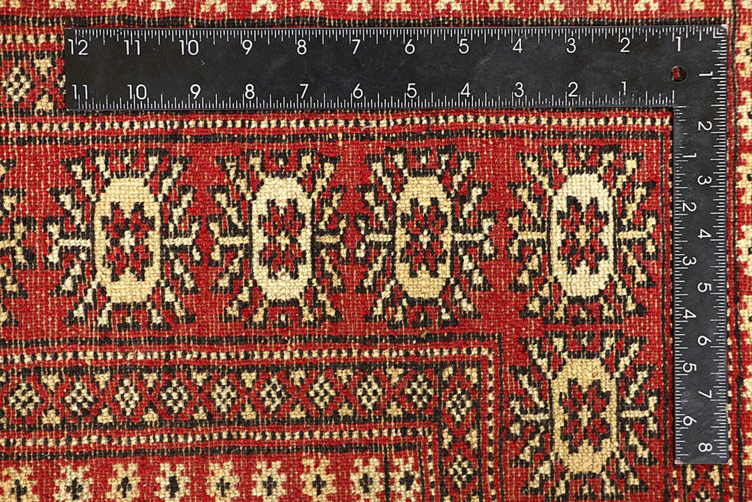 Firebrick Pakistani Bokhara Rug 5' 1" x 8' 2" Hand-Knotted | No. QA84776