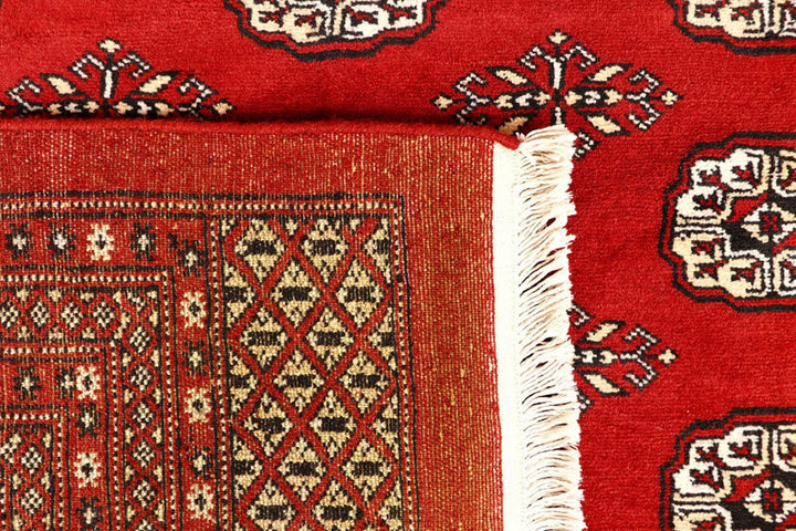 Red Pakistani Bokhara Rug 9' 1" x 11' 9" Hand-Knotted | No. QA85899