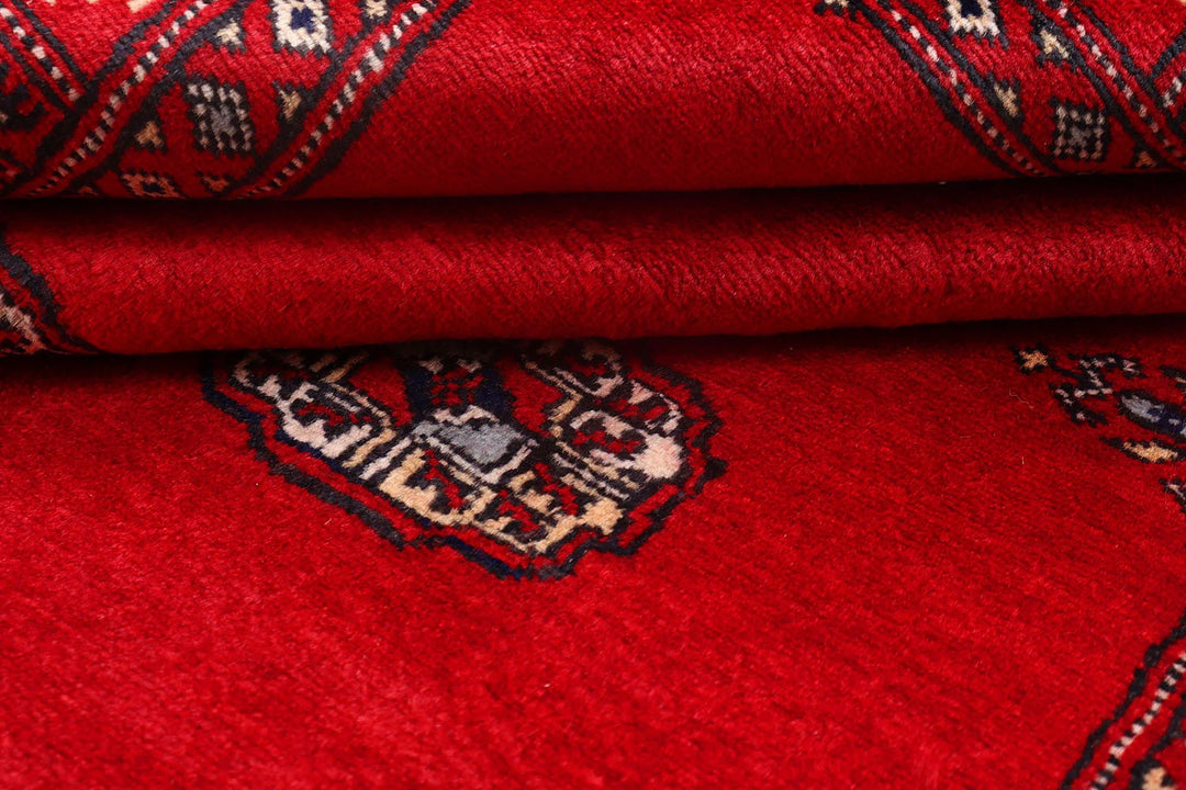 Red Pakistani Bokhara Rug 4' 1" x 6' 5" Hand-Knotted | No. QA85990